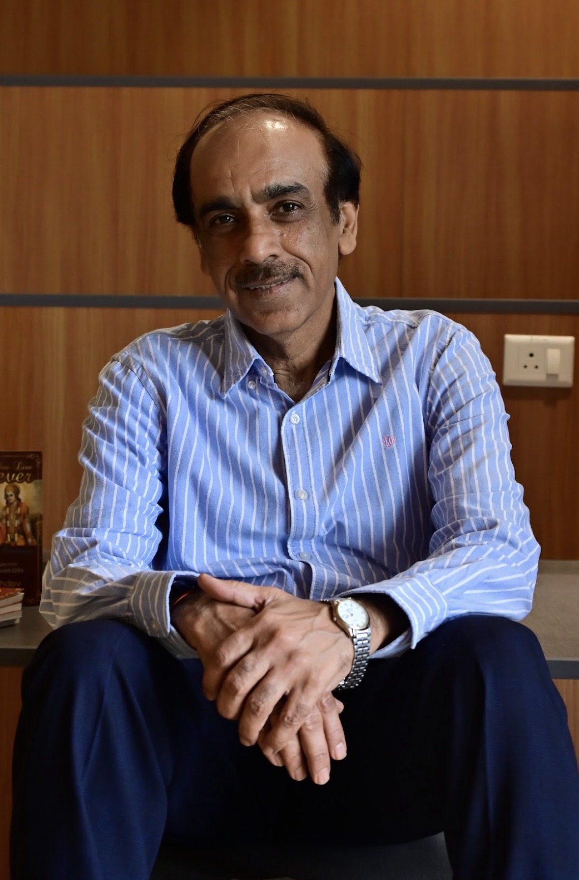Portrait of Rajiv Sachdev, seated