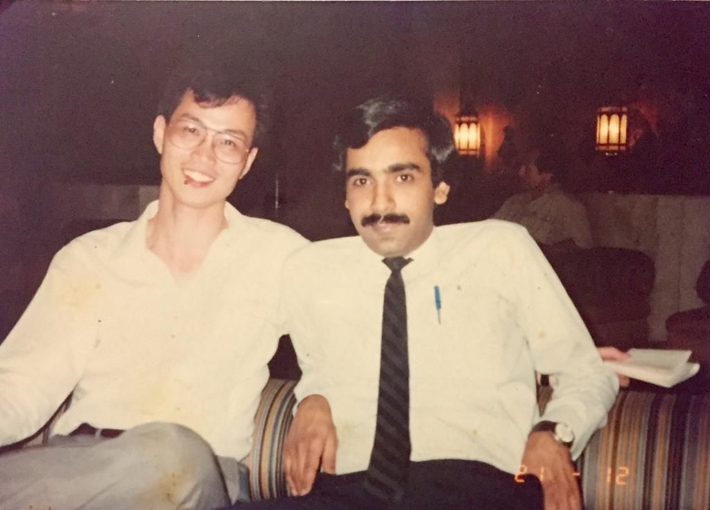 A young Rajiv Sachdev with a friend in Singapore during his IBM years