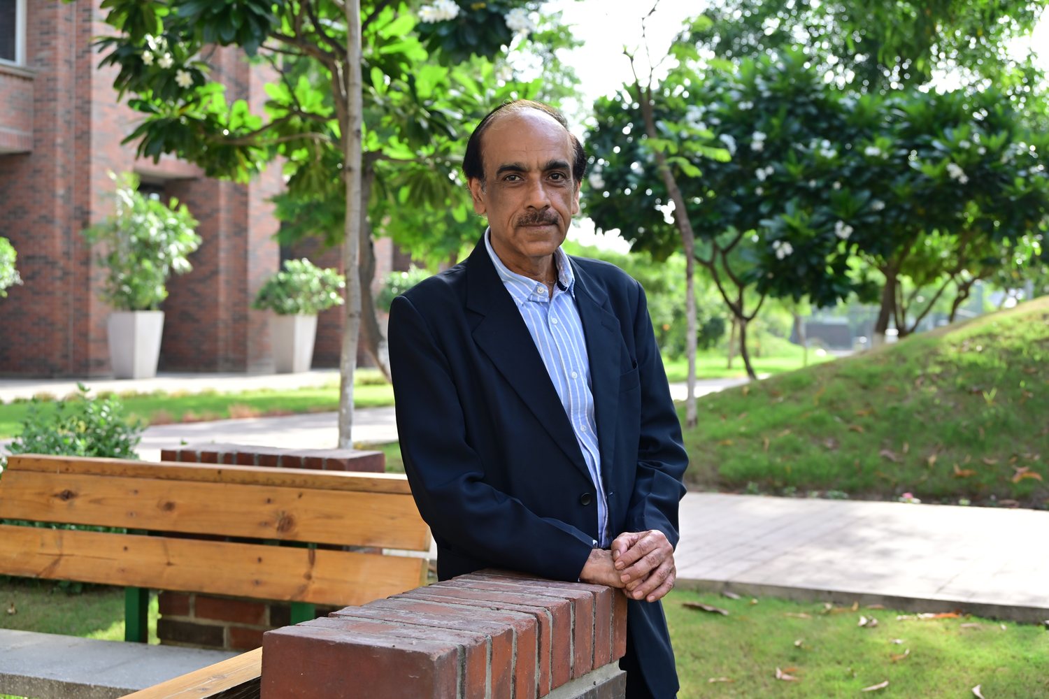 Rajiv Sachdev in a blazer, photographed outdoors